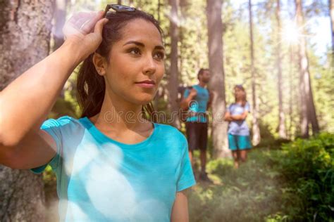 Happy Woman Portrait With Man And Girl Hiking Trail Path In Forest Woods During Sunny Daygroup