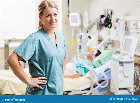 Confident Nurse With Patient Resting In Hospital Stock Photo Image Of