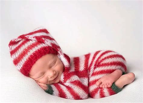 15 Adorable Photos Of Newborn Babies Celebrating Their First Christmas