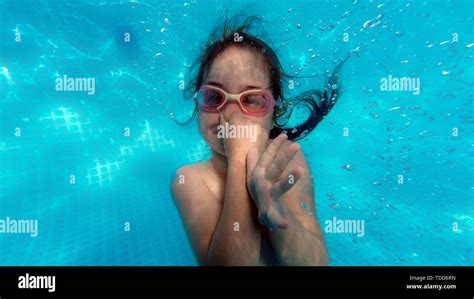 Little Girl Swimming Underwater In Pool Child Having Fun In Summer