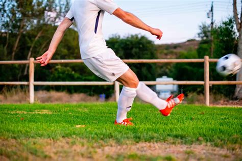 9 steps for how to punt a soccer ball long and far athleticlift
