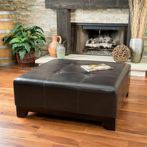 The cool thing about this piece is that it's a fresh take on a traditional piece. Elegant Espresso Brown Leather Ottoman Coffee Table w ...