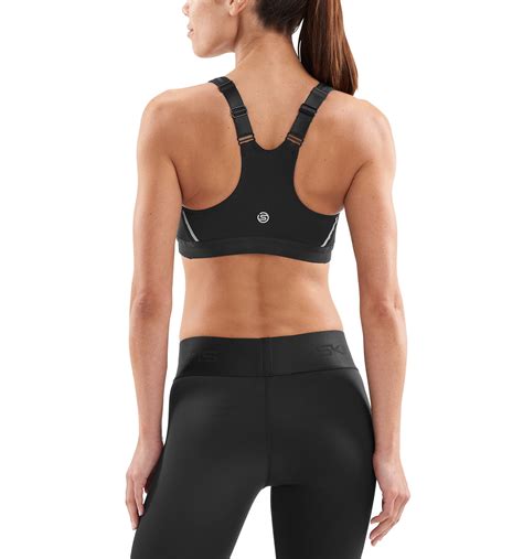 We offers sport bra high impact products. DNAmic High Impact Women Sport Bra - Black | SKINS Compression