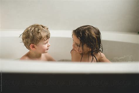 Brother And Sister Talking During Bath Time By Courtney Rust