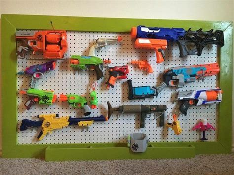 A simple way to organize your nerf guns using pegboards and some commonly used items from. Lime Green frame with white background! Nerf gun storage rack. Pegboard 36x48 or customize your ...