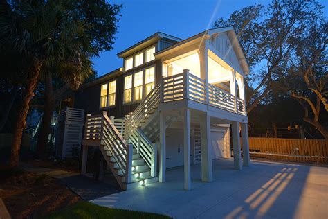 While many coastal homes are located far enough inland to avoid having a raised foundation; Abalina Beach Cottage - Coastal Home Plans