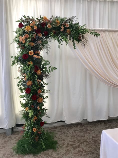 See more ideas about grape arbor, arbor, pergola. Wedding arbor flowers asymmetrical look fall flowers ...