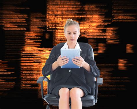 Front View Of Concentrated Chic Businesswoman Using Her Tablet Stock