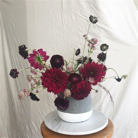 Burgundy Wine Flower Arrangement With Dahlias Ranunculus Scabiosa