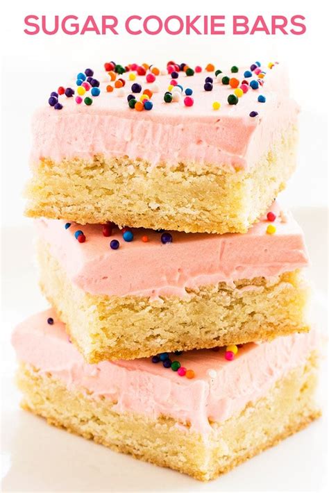 Sugar Cookie Bars Are Topped With A Pink Buttercream Frosting And