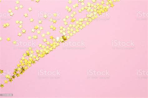 Abstract Pink Background With Gold Glitter Stars Stock Photo Download