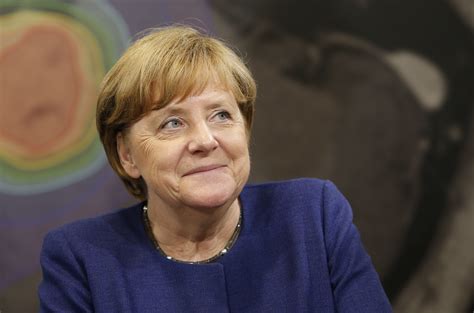 angela merkel profile the eu s most powerful leader is not a liberal hero she s a walking
