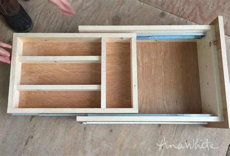 Use a silverware organizer and small bins to cut down the mess and clutter. Kitchen Drawer Organizer - Adding a Double Drawer to ...