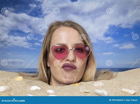 Woman Buried In Sand On Beach With Sunglasses Stock Photo Image Of