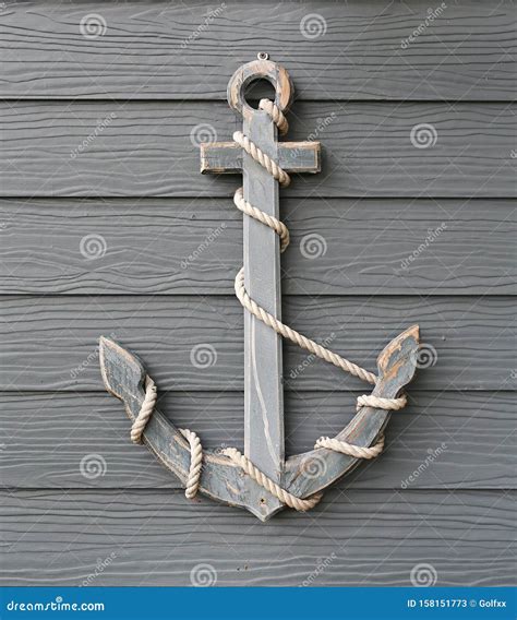 Wooden Anchor With Rope On Wood Plank Wall Background Stock Image