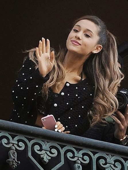 Ariana Grande Blows Kisses To Fans From The Window Of The Amstel Hotel