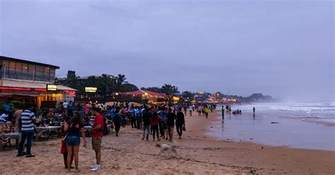 People Enjoying An Evening In Baga Beach In Goa Besides The Sea And The Restaurant Pixahive