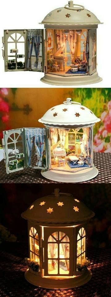 A Lantern Is Turned Into An Adorable Miniature Home Crafts