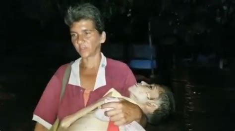 Mum Carries 22lb Body Of Daughter To Morgue Amid Venezuela Power Cut