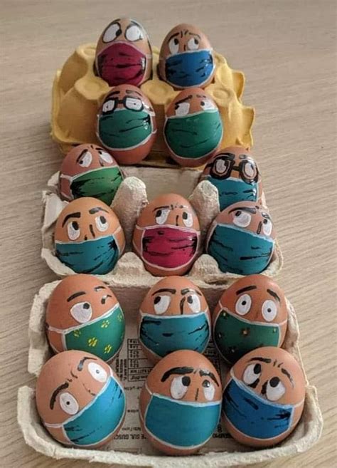 People Decorate Easter Eggs Cakes And Chocolate Bunnies With Masks
