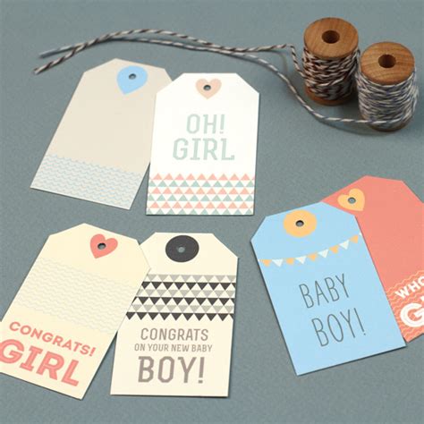 A cute set of labels in shades of soft blue for either a baby boys first birthday or baby shower. Free Baby Gift Tag Printables - 24/7 Moms