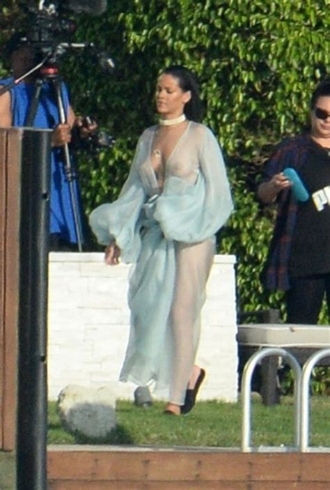 Photos — Rihanna Wears No Bra And See Through Lingerie In