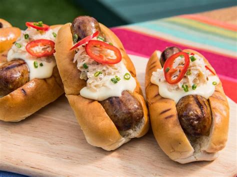 The Ultimate Cheesy And Spicy Reuben Brats Recipe Jeff Mauro Food