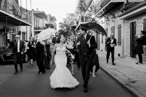 Couple Happily Walking Down The New Orleans Street In Wedding Parade Photo By Dark Roux