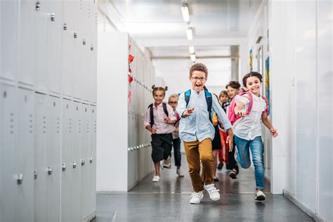 Pupils Running Through School Corridor Life In Brunswick County
