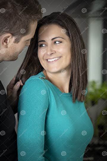 Couple Talking And Cuddling In Their Kitchen Stock Image Image Of