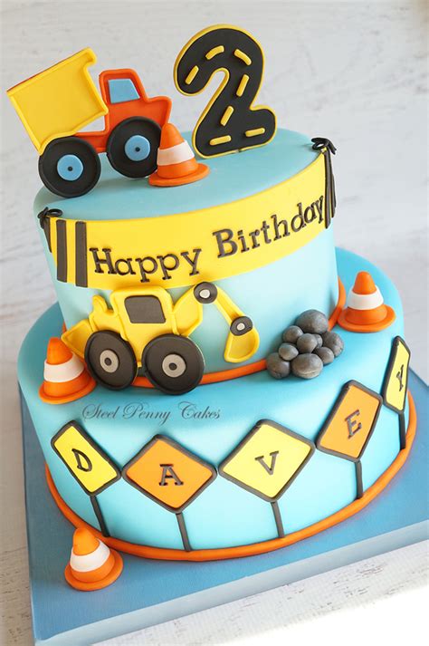 Kid celebrating birthday and blowing cake candles. Construction Themed 2Nd Birthday Cake Inspired By The Party Decor - CakeCentral.com