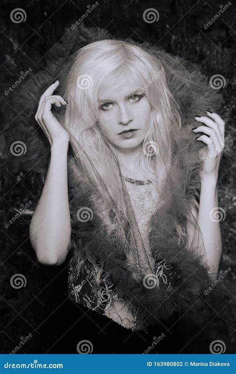 Portrait Of A Young Girl In A Veil Black And White Photo Stock Photo