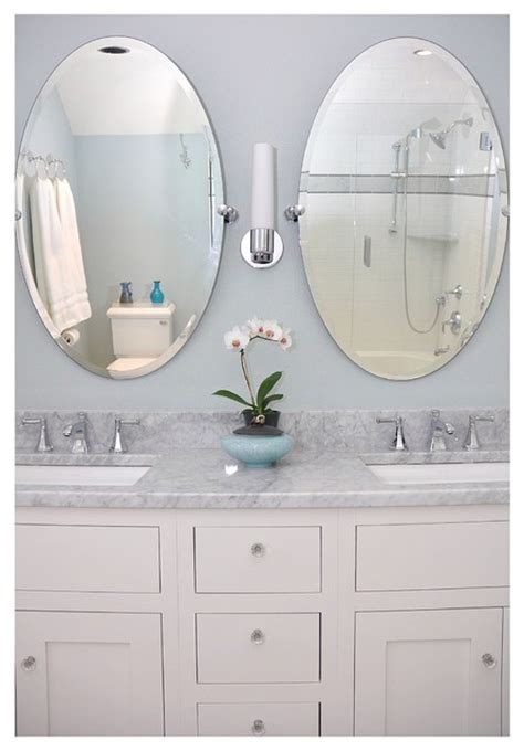 Makeup and shaving mirrors are a great addition to any bathroom. Double sink with oval mirrors - Traditional - Bathroom ...