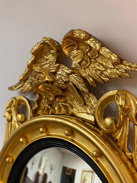 Early 19th Century American Federal Gilt Convex Eagle Mirror For Sale