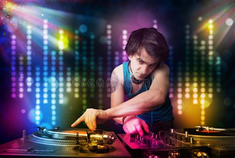 Dj Playing Songs In A Disco With Light Show Stock Image Image Of
