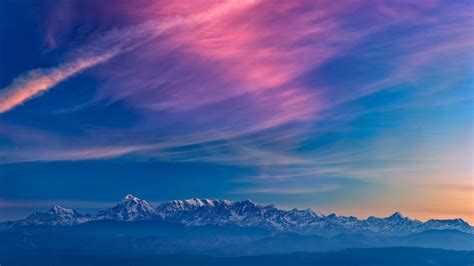 Download Wallpaper 1366x768 Horizon Blue Sky Mountains Fog Sunset