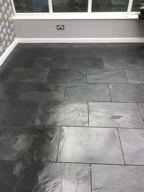 Black Slate Tiled Floor Stained By Decorators In Hampton South