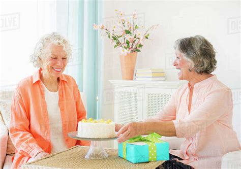 Two Senior Women Celebrating Birthday Stock Photo Dissolve
