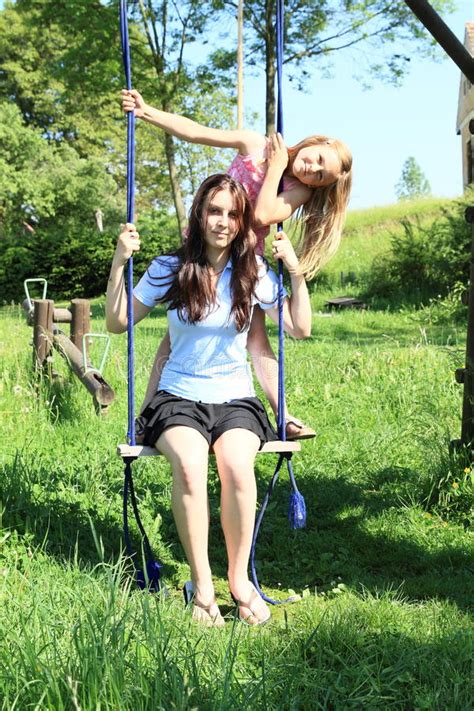 Download this free photo about girls playing together, and discover more than 8 million professional stock photos on freepik. Girls swinging on swing stock photo. Image of play ...