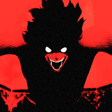 An Evil Looking Demon With Glowing Eyes And Fangs On His Face Against A Red Background