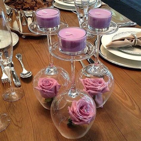 Upside Down Wine Glasses As Candle Holders And Flower Covers