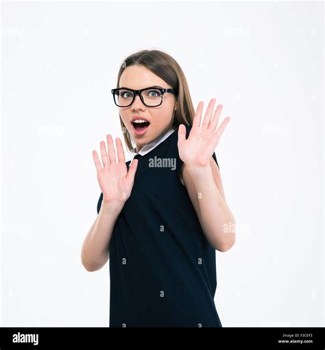 Portrait Of A Shocked Young Woman Making Stop Gesture With Palms