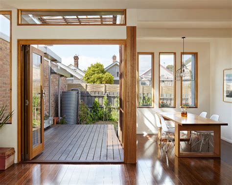 This will require you to patch the walls afterward, but installing framing—especially the header—inside a wall is difficult. Wood Window Frame Home Design Ideas, Pictures, Remodel and ...