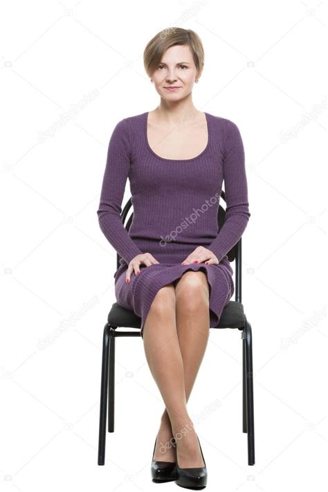 Woman Sits A Chair Enticing Gesture Expresses Excitement Crossed