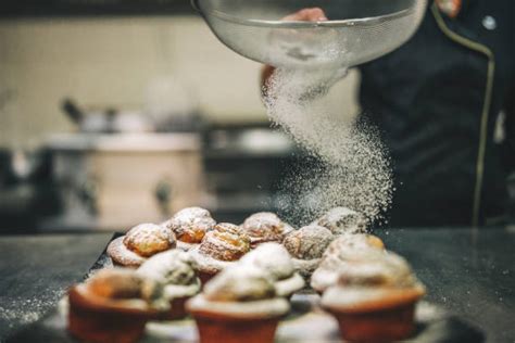 Hand Sprinkling Sugar Stock Photos Pictures And Royalty Free Images Istock