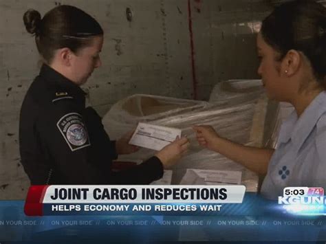 Officials Working Together To Inspect Cargo