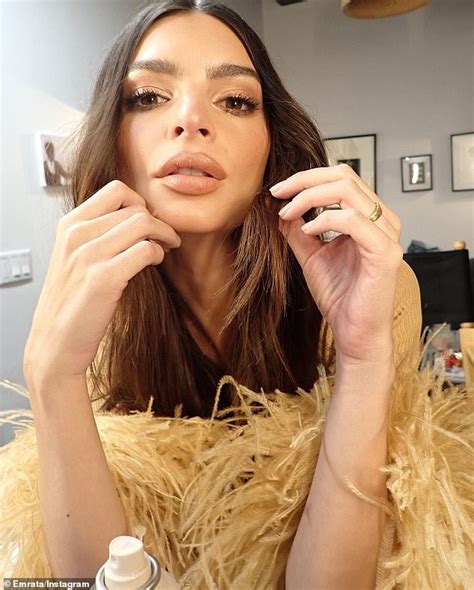 Emily Ratajkowski Shares Sultry Backstage Snaps From Saturday Night