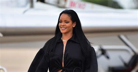 rihanna drips in sex appeal as she arrives in barbados