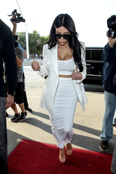 Showoff Braless Kim Kardashian Flaunts Cleavage In Low Cut Crop Top