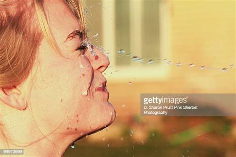 Squirting Water In Face Photos And Premium High Res Pictures Getty Images